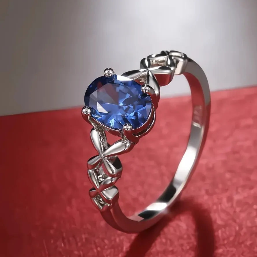 Blue Oval CZ Brass Ring with Cross Twine Design for Women Wedding Band
