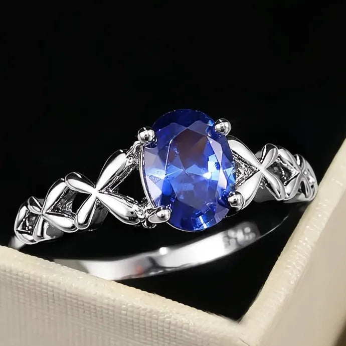 Blue Oval CZ Brass Ring with Cross Twine Design for Women Wedding Band
