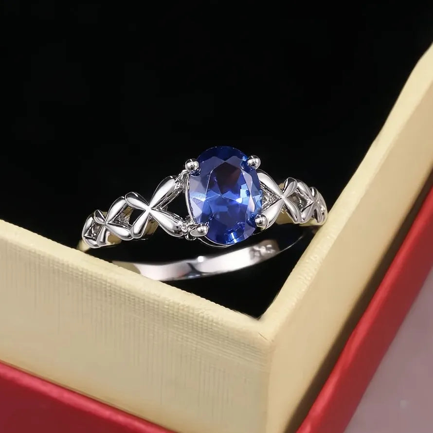 Blue Oval CZ Brass Ring with Cross Twine Design for Women Wedding Band