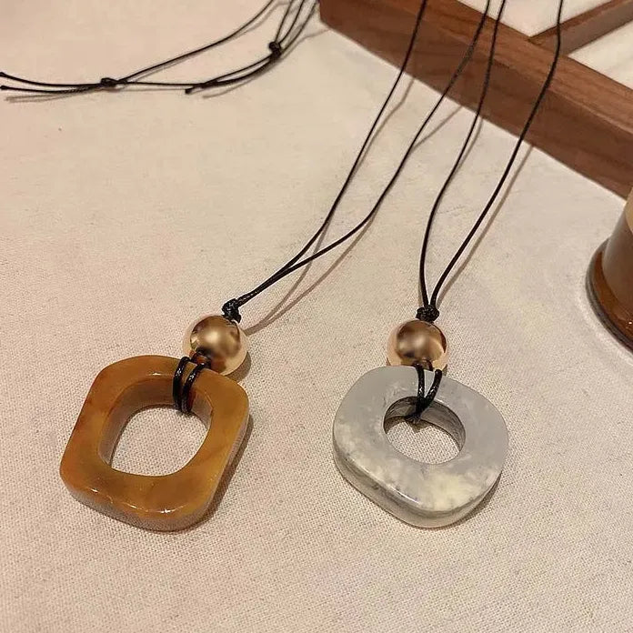 Round Hollow Pendant Necklace for Women Black Leather Rope Sweater Chain Geometric Design