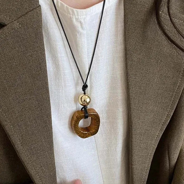 Round Hollow Pendant Necklace for Women Black Leather Rope Sweater Chain Geometric Design