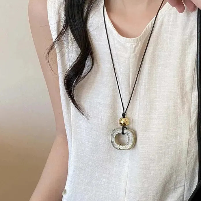 Round Hollow Pendant Necklace for Women Black Leather Rope Sweater Chain Geometric Design
