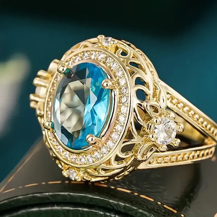 Gold Cocktail Ring with Blue Cubic Zirconia Inlay for Women’s Parties