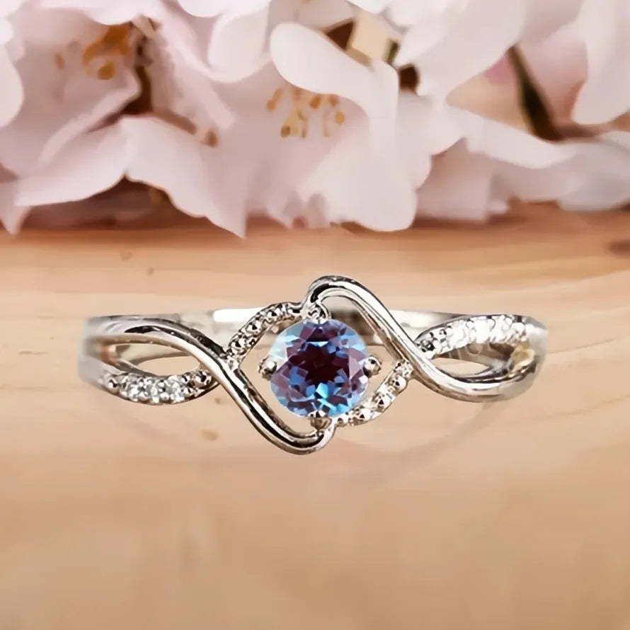 Elegant Women’s Geometric Twist Ring with Blue CZ Brass Wedding Band