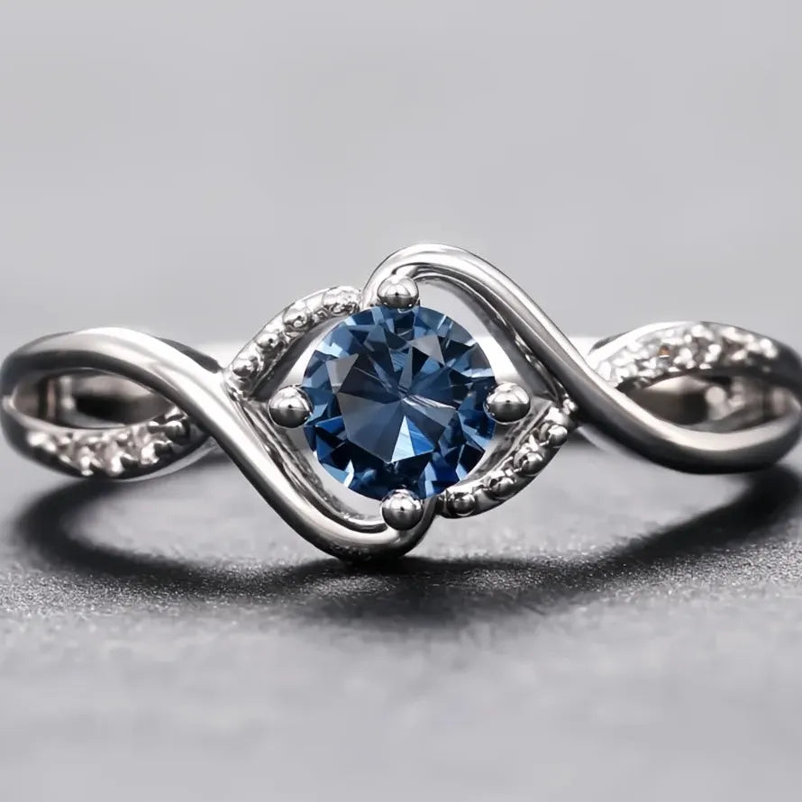 Elegant Women’s Geometric Twist Ring with Blue CZ Brass Wedding Band