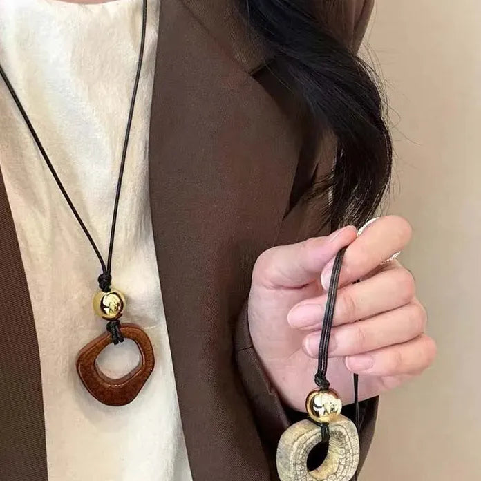 Round Hollow Pendant Necklace for Women Black Leather Rope Sweater Chain Geometric Design