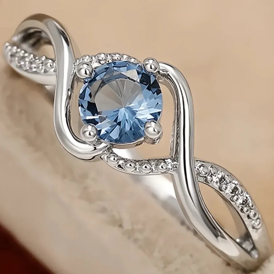Elegant Women’s Geometric Twist Ring with Blue CZ Brass Wedding Band