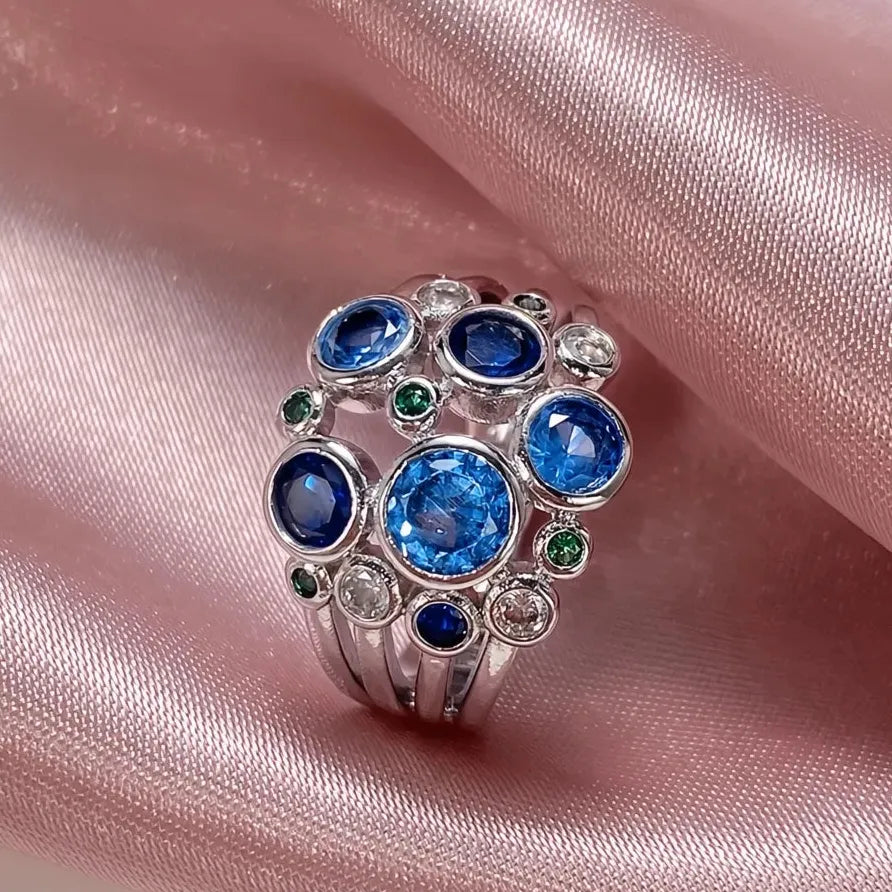 Colorful Wide Band Women’s Ring with Blue, Green & White CZ Gems