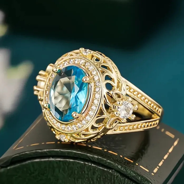 Women’s Gold Color Wedding Band with Oval Blue Cubic Zirconia Ring