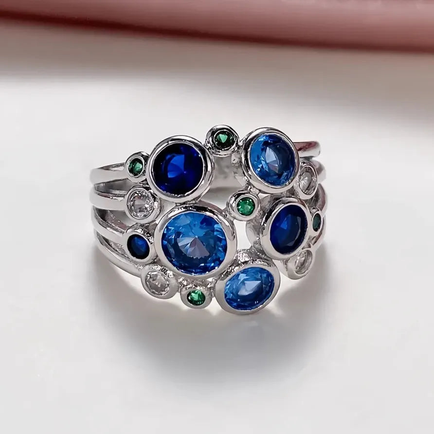 Colorful Wide Band Women’s Ring with Blue, Green & White CZ Gems