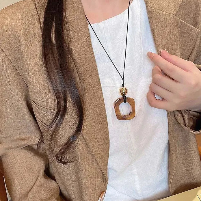 Round Hollow Pendant Necklace for Women Black Leather Rope Sweater Chain Geometric Design