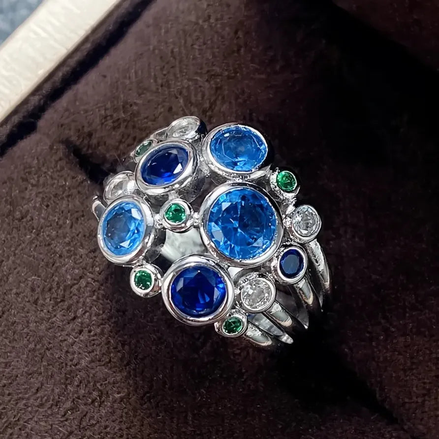 Colorful Wide Band Women’s Ring with Blue, Green & White CZ Gems
