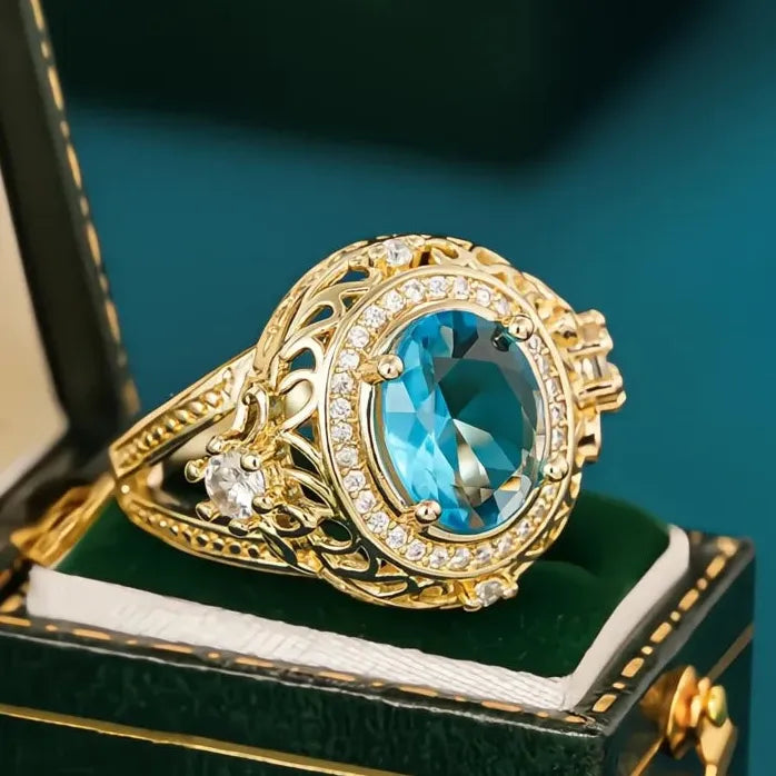 Women’s Gold Color Wedding Band with Oval Blue Cubic Zirconia Ring