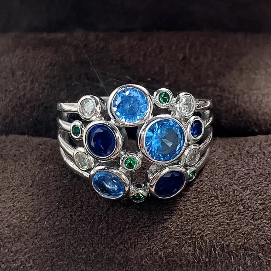 Colorful Wide Band Women’s Ring with Blue, Green & White CZ Gems