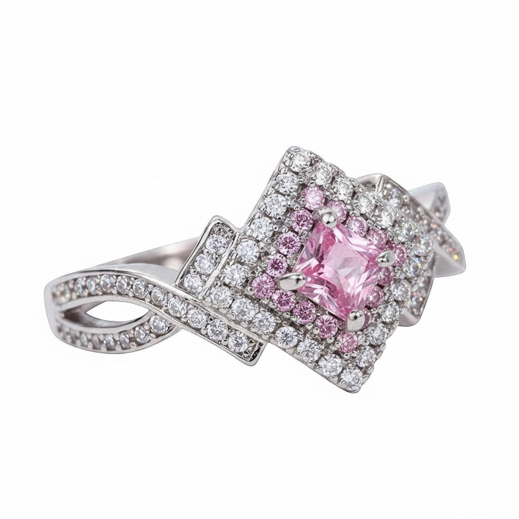 masiniaelara silver ring with a square pink center stone surrounded by white and pink cubic zirconia.
